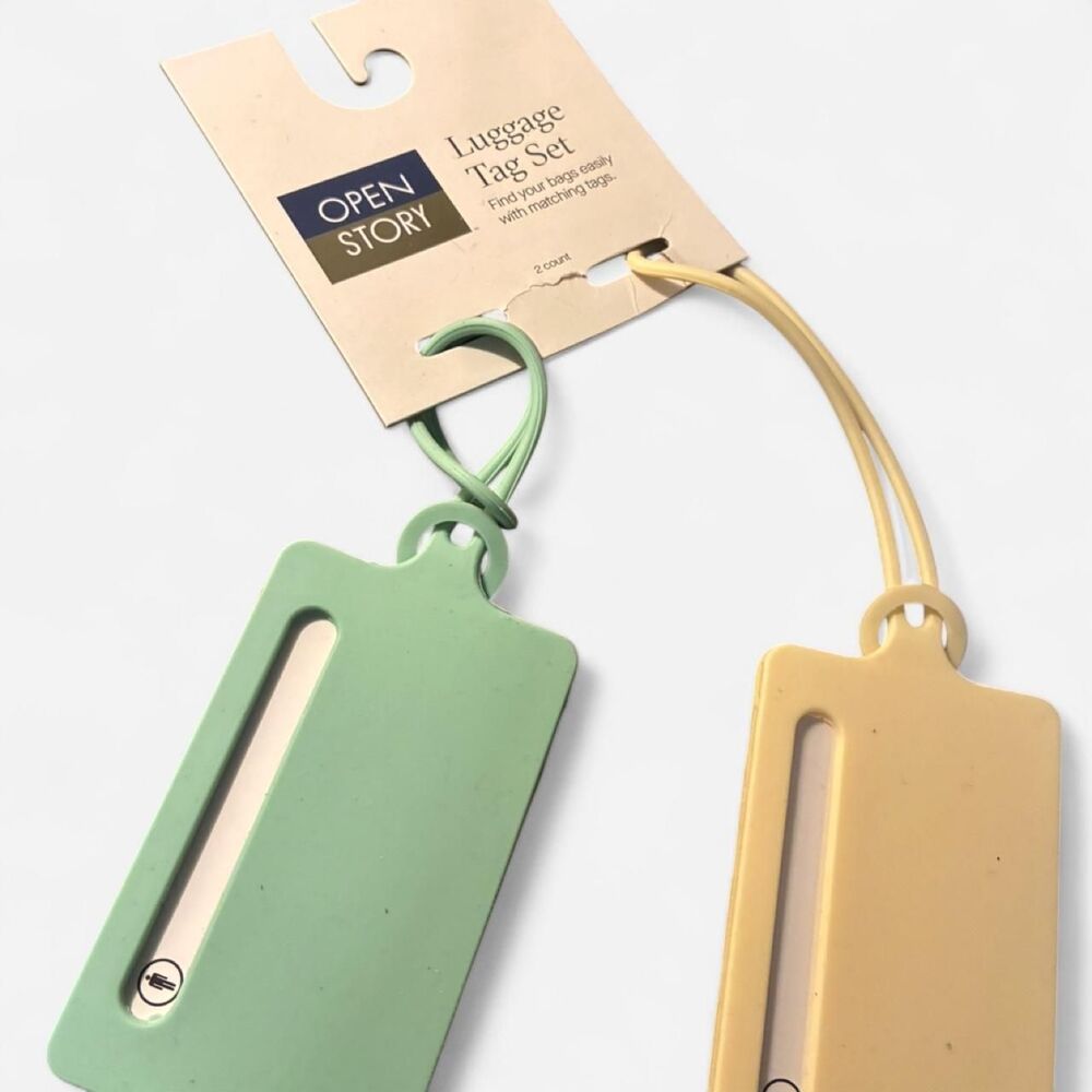 Two NWT Luggage Tags